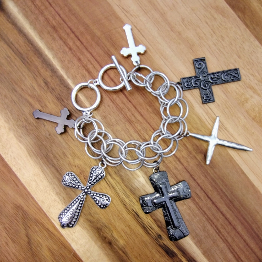 The ultimate Crucifix Charm Bracelet. Beautiful statement jewelry